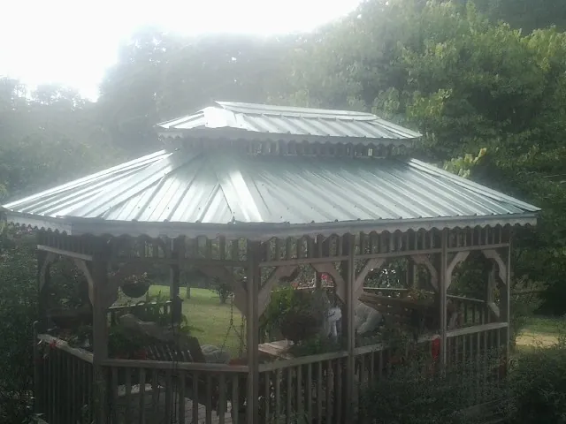 Two tier green metal roof on a garden gazebo in Agoura Hills